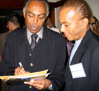 Gilberto Gil signs an autograph